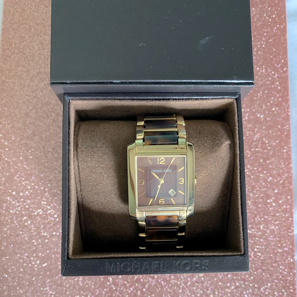 Michael Kors Women’s Tortoise Link Square watch.